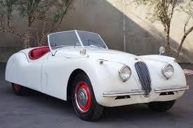 Image result for Old English White 1955 Jaguar