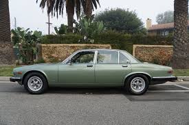 Image result for Poseidon Dark Green 1985 Jaguar