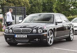 Image result for Black Cherry 2006 Jaguar