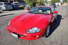 Image result for Phoenix Red 1999 Jaguar