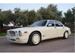 Image result for Nimbus White 1987 Jaguar