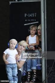 Image result for Queen B by Bumbleride $428 Gwen Stefani and Gavin Rossdale with Kingston and Zuma at the LA zoo