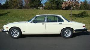 Image result for Nimbus White 1987 Jaguar