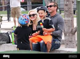 Image result for Queen B by Bumbleride $428 Gwen Stefani and Gavin Rossdale with Kingston and Zuma at the LA zoo