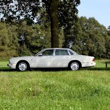 Image result for New Glacier White 1991 Jaguar