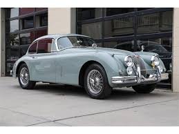 Image result for Silver Blue 1959 Jaguar