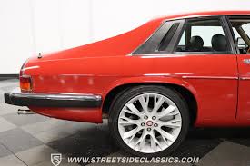 Image result for Grenadier Red 1987 Jaguar