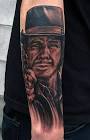 Charles Bronson black and grey portrait arm tattoo - charles-bronson-black-and-grey-arm-tattoo-jon-von-glahn