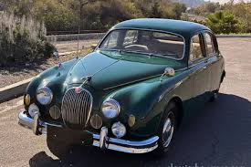 Image result for Dark Green 1959 Jaguar