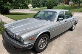 Image result for Nimbus White 1987 Jaguar