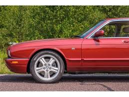 Image result for Carnival Red 1999 Jaguar