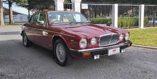 Image result for Sebring Red 1986 Jaguar