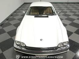 Image result for Glacier White 1989 Jaguar