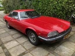 Image result for Sebring Red 1986 Jaguar