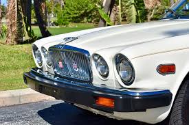 Image result for Nimbus White 1987 Jaguar