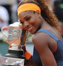 American Serena Williams holds the championship trophy after winning her French Open women&#39;s final match against Russian Maria Sharapova at Roland Garros in ... - Serena-Williams-builds-huge-lead-at-No-1-in-world-rankings