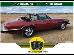 Image result for Sebring Red 1986 Jaguar