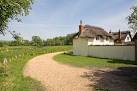 The Test Way passes The Old Cottage on Chilbolton Common. This private drive - via Daymix