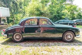 Image result for Dark Green 1959 Jaguar