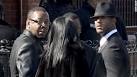 Bobby Brown, left, outside the