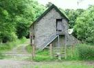 coach house with living - via Daymix