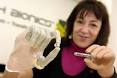 Patient Maria Iglesias holding a nut with ProDigits - touchbionics-finger-maria-iglesias