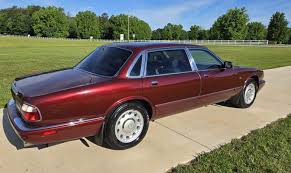 Image result for Phoenix Red 1999 Jaguar