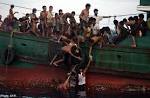 800 migrants rescued off Indonesia as pressure grows for solution.