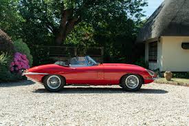 Image result for Maroon 1962 Jaguar