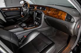 Image result for Black Cherry 2006 Jaguar