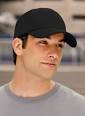 This Screaming Eagles Football cap also features: