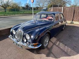 Image result for Dark Blue 1965 Jaguar