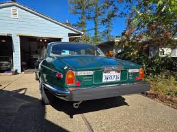Image result for Poseidon Dark Green 1979 Jaguar