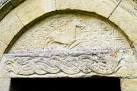 The Lamb and Cross have a background of ornamental diaper and a Viking - via Daymix