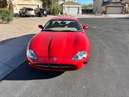 Image result for Phoenix Red 1999 Jaguar
