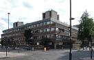 City University, Goswell Road. Built of dark-brown brick and concrete, - via Daymix
