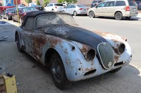Image result for Silver Blue 1959 Jaguar