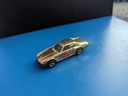 Image result for Burgundy 1983 Jaguar