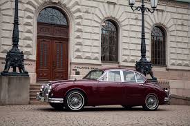 Image result for Burgundy 1983 Jaguar