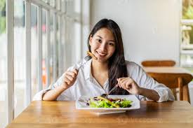 Image result for women eating salad and smiling