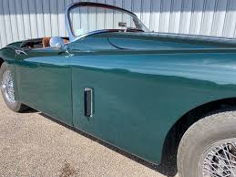 Image result for Dark Green 1959 Jaguar