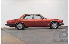 Image result for Cranberry Red 1983 Jaguar