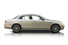 Image result for Winter Gold Pearl 2007 Jaguar