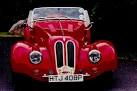 Custom red sports car in - via Daymix