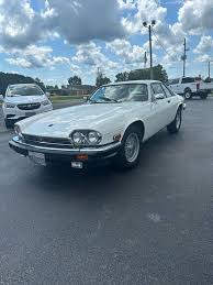 Image result for Glacier White 1989 Jaguar