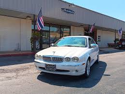 Image result for White Onyx 2002 Jaguar