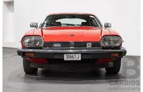 Image result for Sebring Red 1986 Jaguar