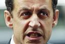Sarkozy grimace