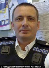 Death: A coroner ruled PC Ian Dibell had been unlawfully killed by a single wound to the chest - article-2305901-192B8CD0000005DC-69_306x423