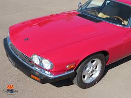 Image result for Sebring Red 1986 Jaguar